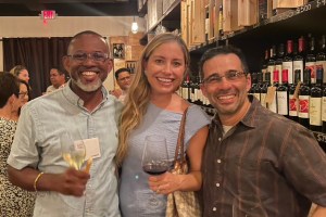 Guests toasting to FundBank's rebrand in the Cayman Islands.